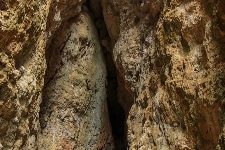 a man sitting on a rock