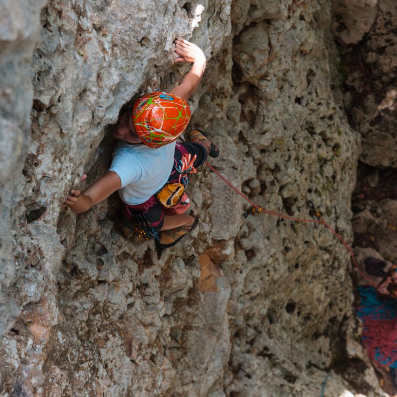 a person standing on a rock